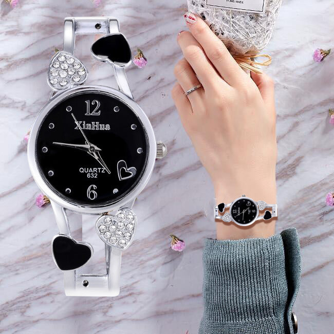 Ladies silver wrist watch with diamond design