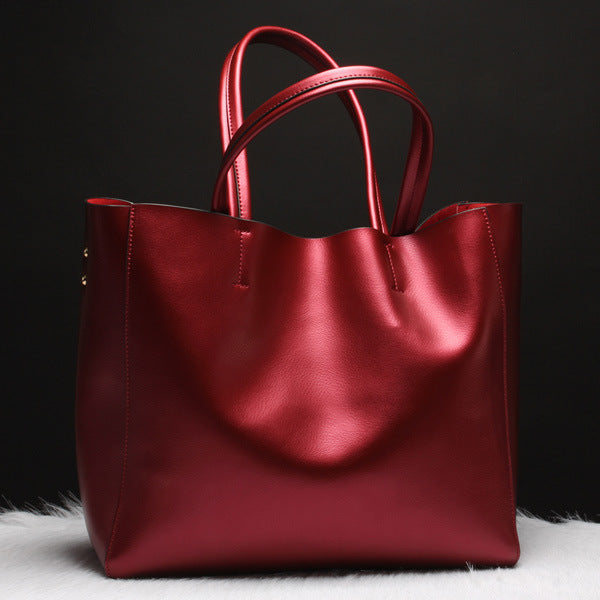 Red handbag on a black background