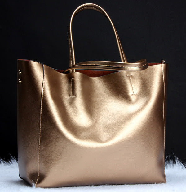 Gold handbag on a black background