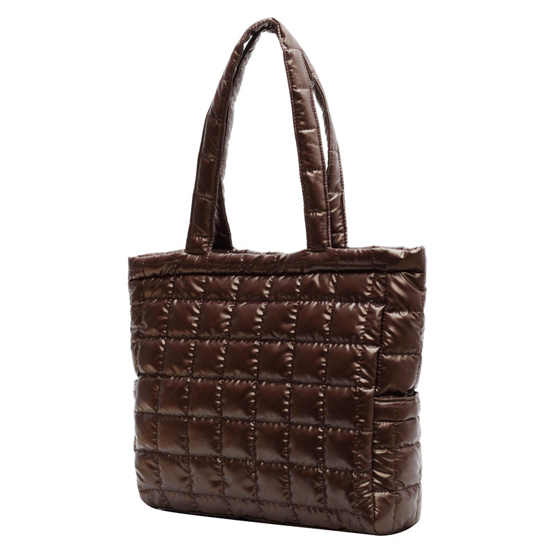 Brown quilted women's plaid shoulder bag on a white background
