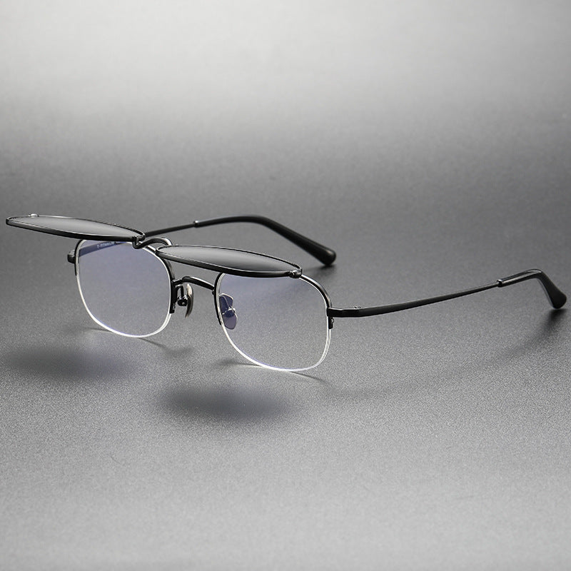 Pair of eyeglasses on a gray background