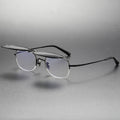 Pair of eyeglasses on a gray background