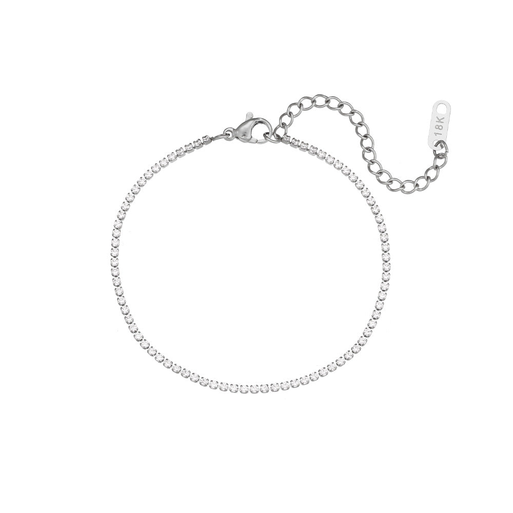 Silver tennis necklace on a white background