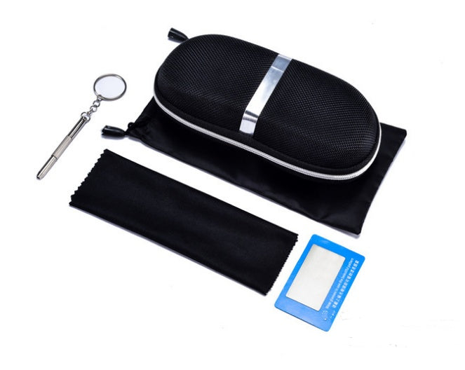 Eyeglass case, cleaning cloth, keychain, and card on a white background