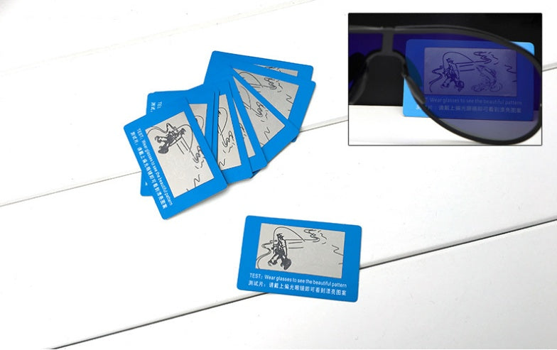 Blue cards with illustrations and a pair of sunglasses on a white background