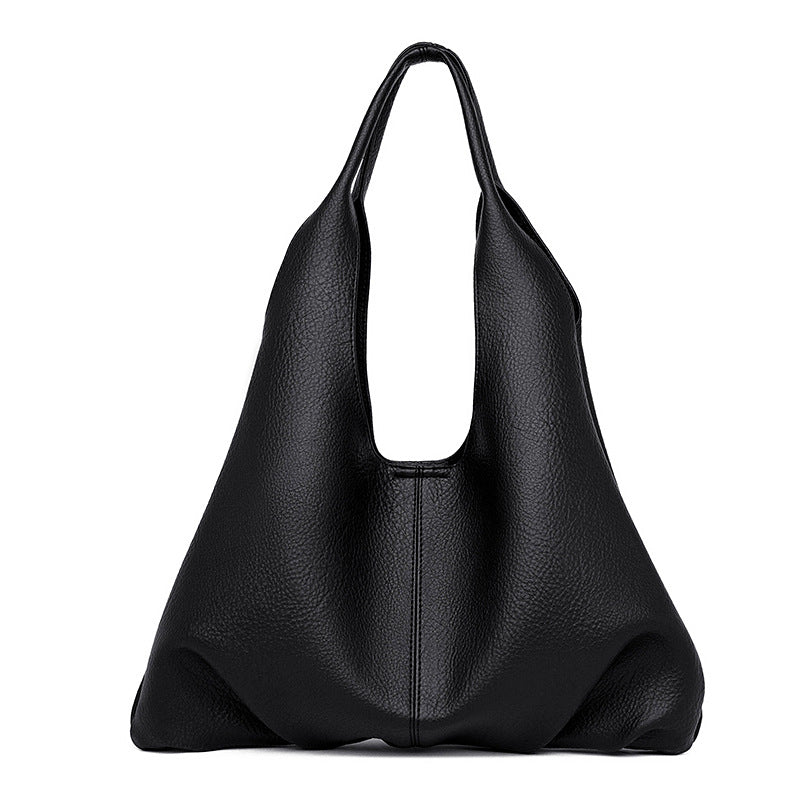 Black leather underarm shoulder bag on a white background