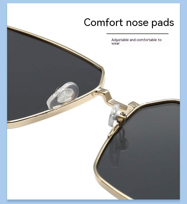 Sunglasses with comfort nose pads on a white background