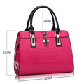 Pink crocodile pattern handbag with measurements on a white background.