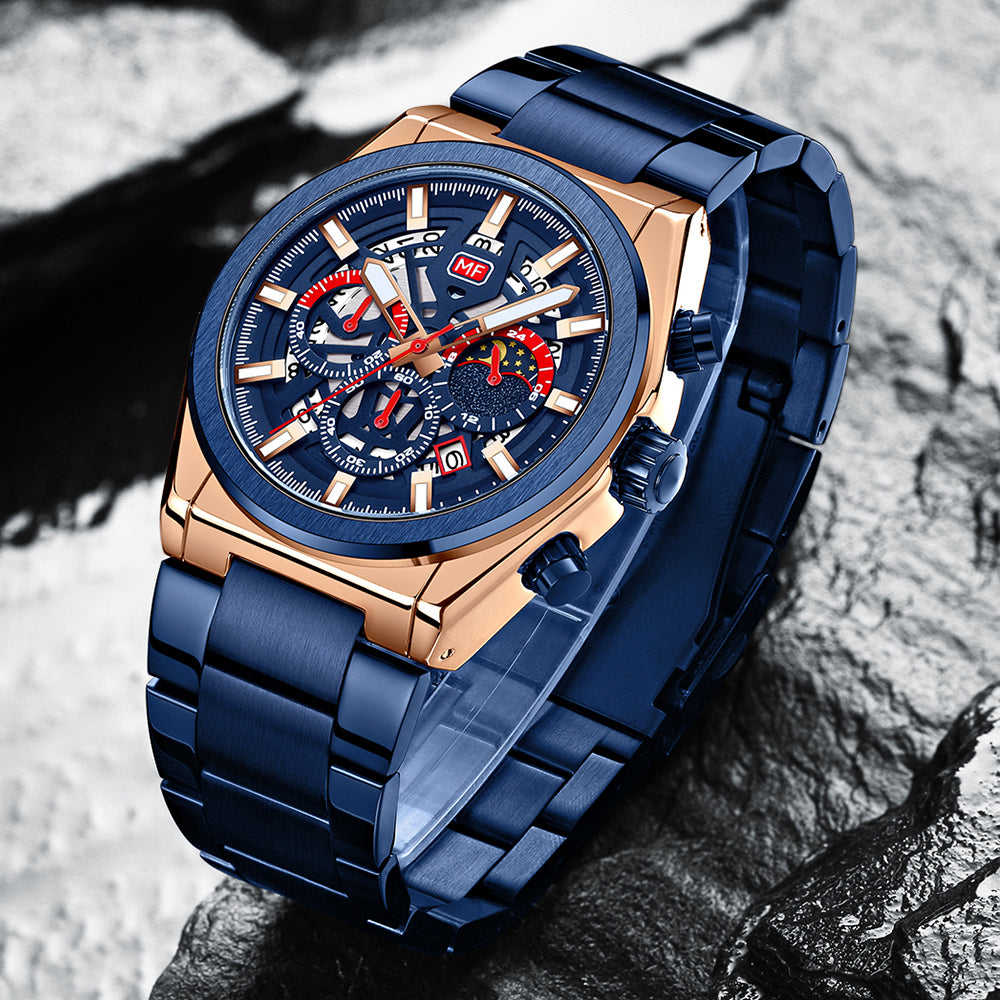Blue and rose gold men's quartz watch on a textured surface