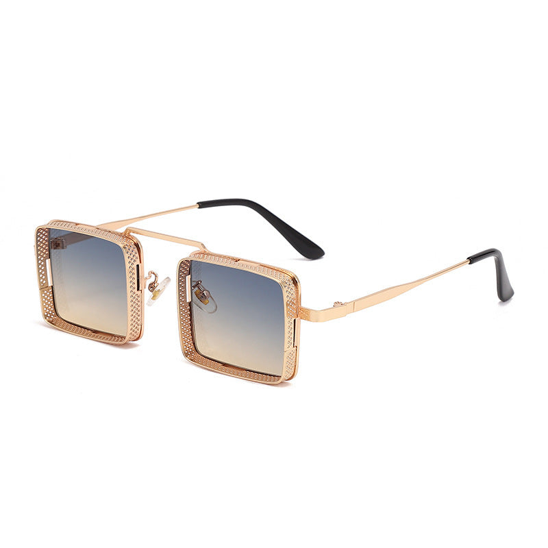 Gold-framed sunglasses with gradient lenses on a white background