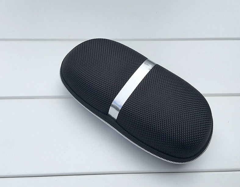 Black textured case with a silver band on a light wooden surface