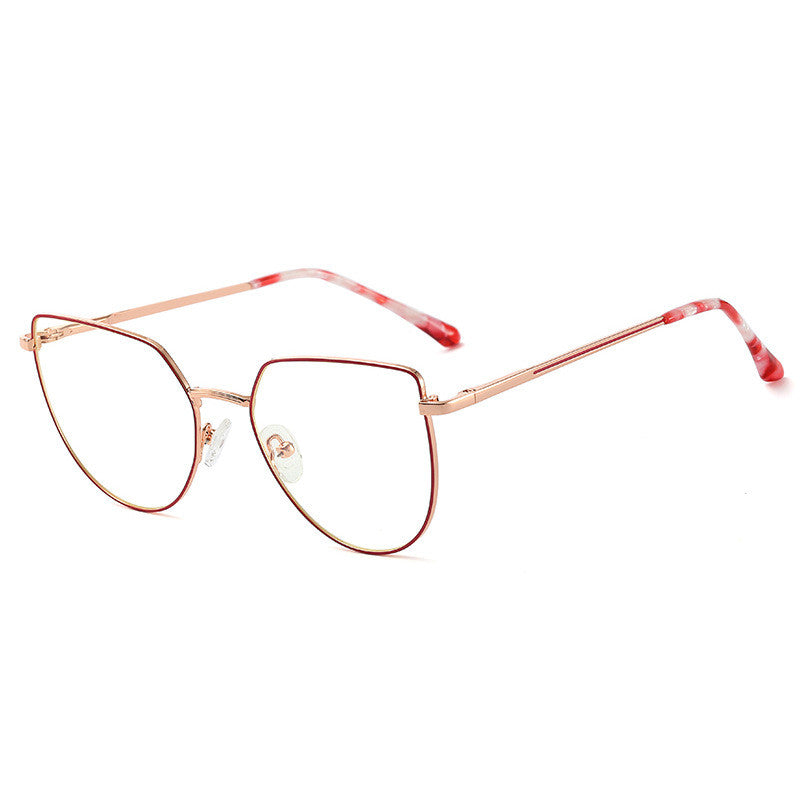 Cat-eye glasses with rose gold frame and red accents on a white background