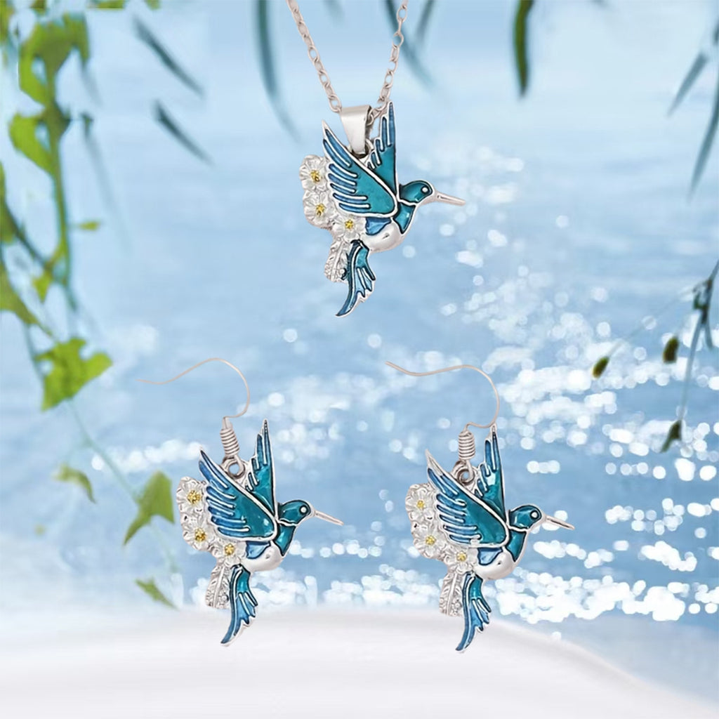 Jewelry set with blue bird-shaped eardrops and pendant necklace