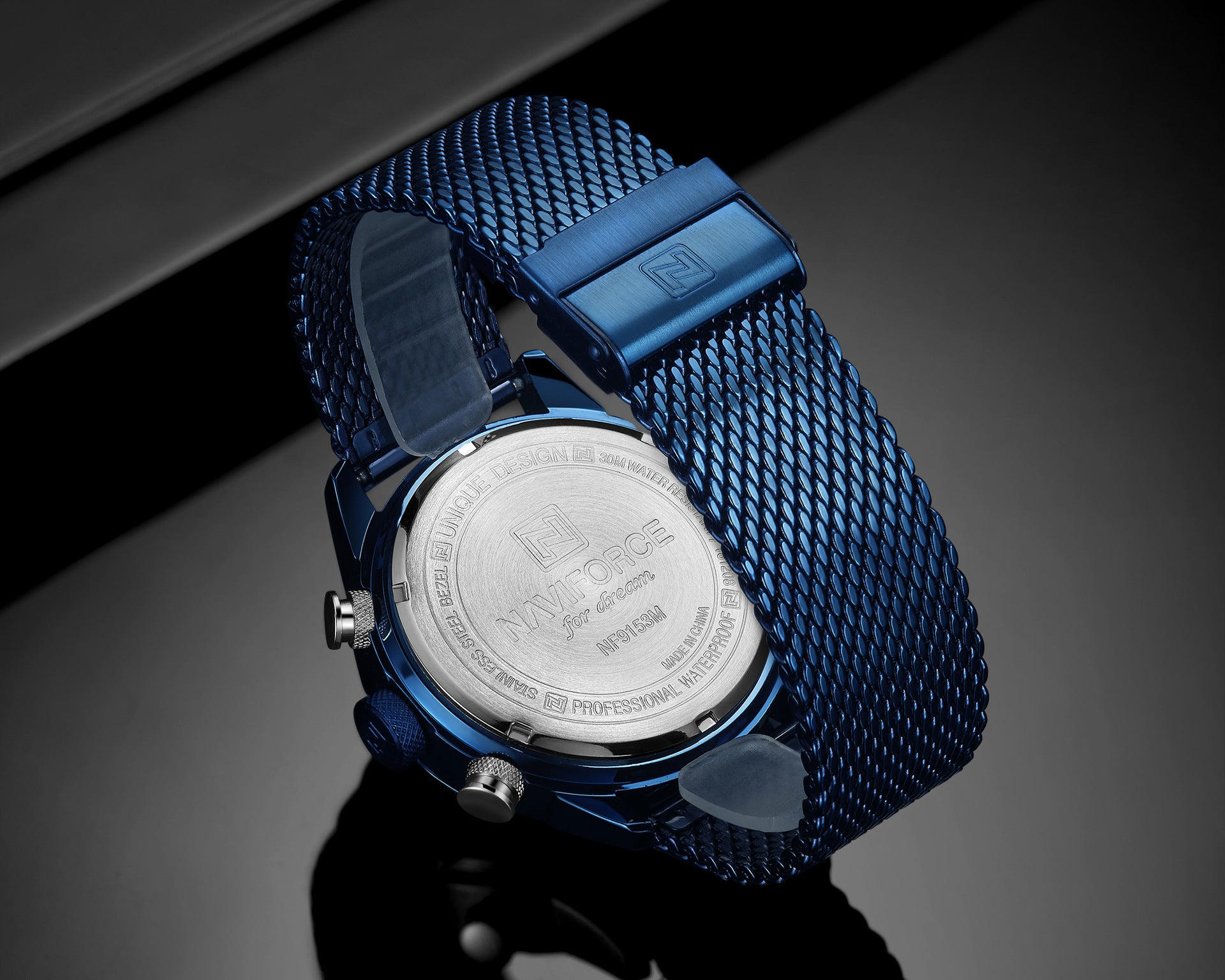 Blue mens sport watch with mesh strap on a dark background