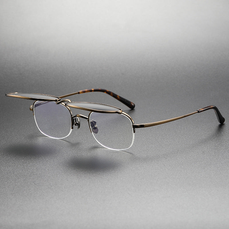 Pair of eyeglasses on a gray background
