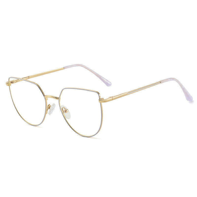 Gold-framed eyeglasses on a white background