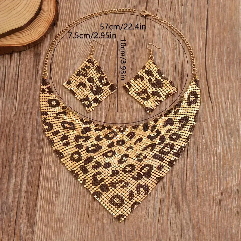 Leopard print scarf necklace and earrings with measurements on a wooden surface
