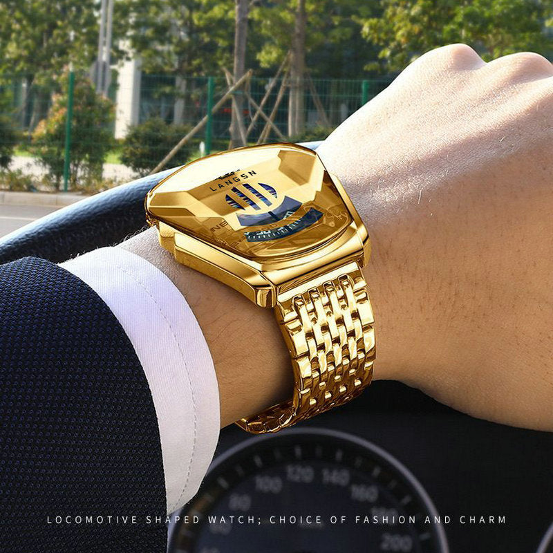 mens watch with a unique gold design on a person's wrist.