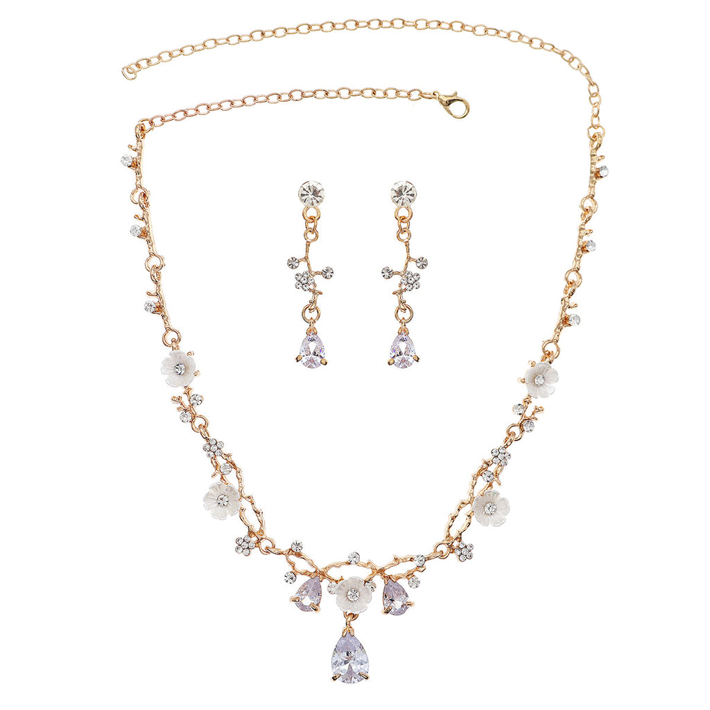 pearl necklace & earrings jewelry set on a white background