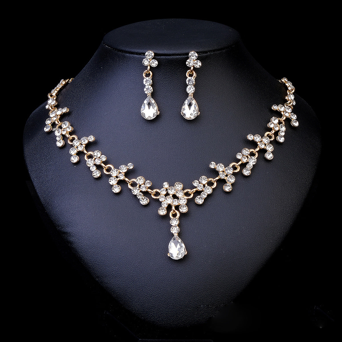 pearl necklace jewelry set on a black mannequin bust