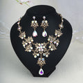 pearl necklace jewelry set on a black stand