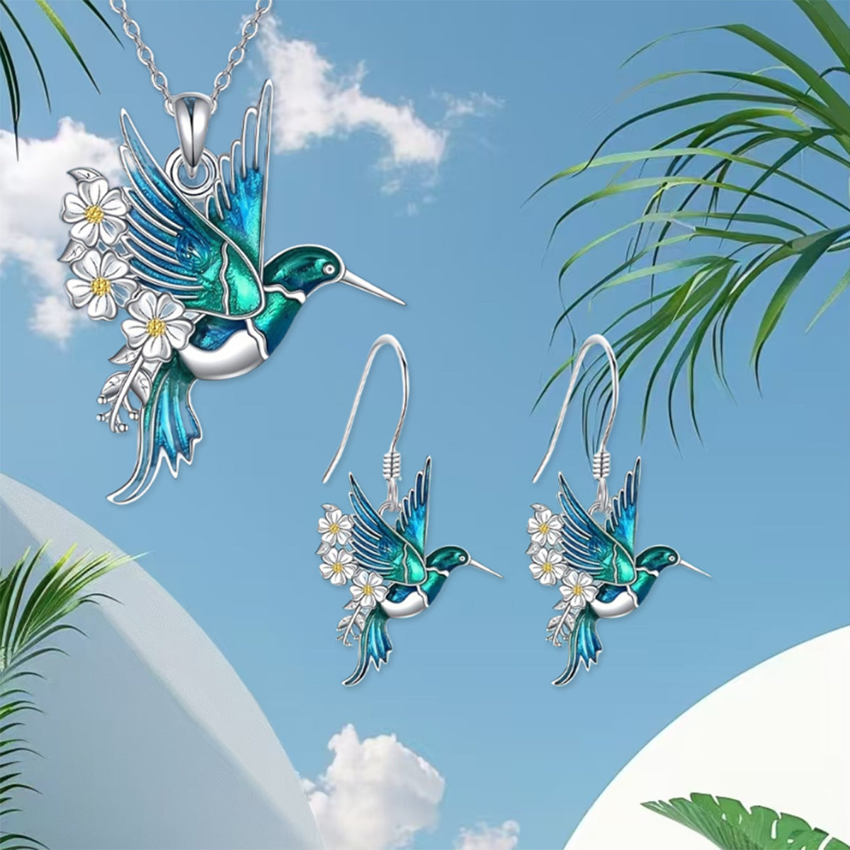 pendant necklace and earrings set with hummingbird design