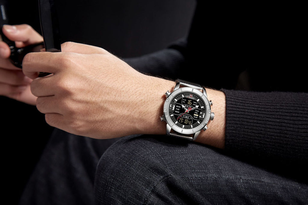 Person wearing a silver mens sport watch