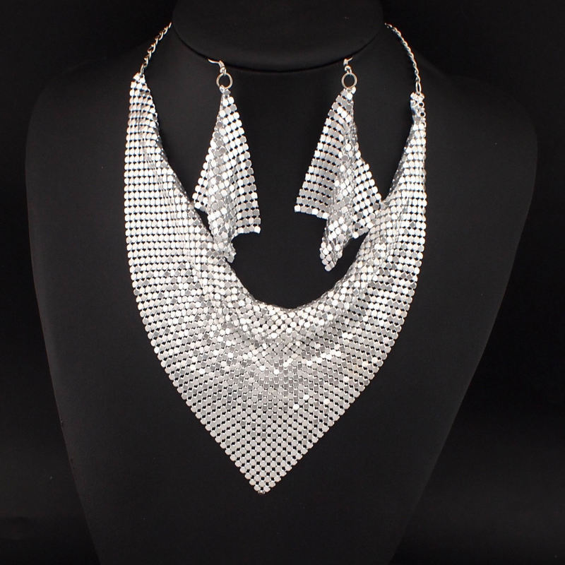 Silver scarf necklace and earrings set on a black mannequin